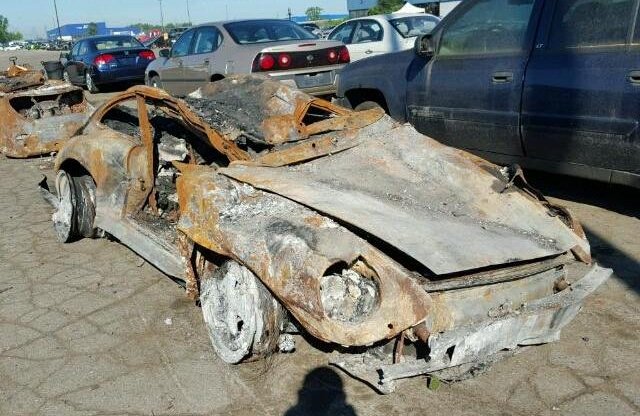 Szénné égett Porsche 26 millió forintért